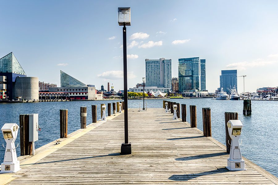 Blog - View of Empty Wooden Jetty and Baltimore City Skyline